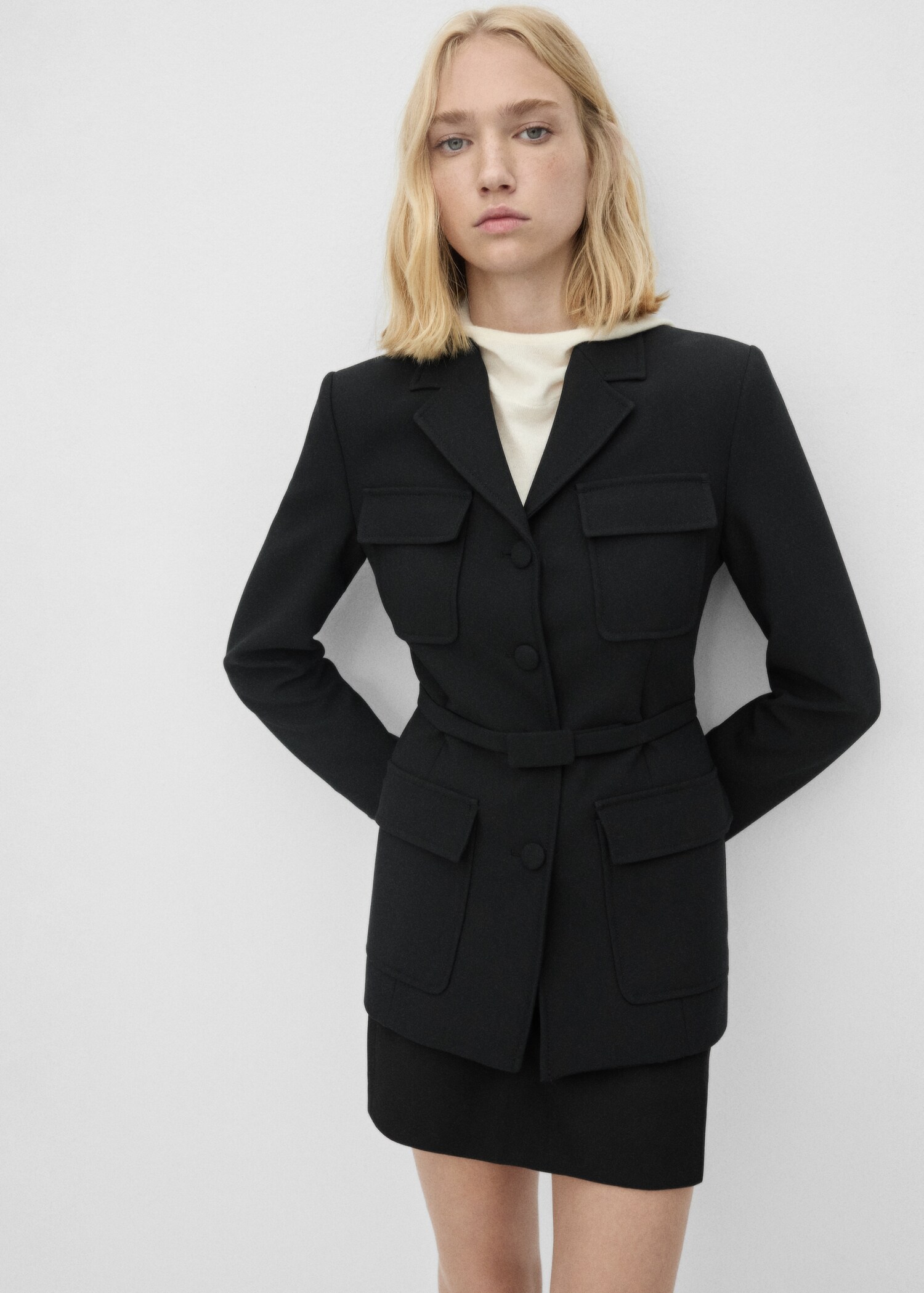 Jacket with belt and pockets