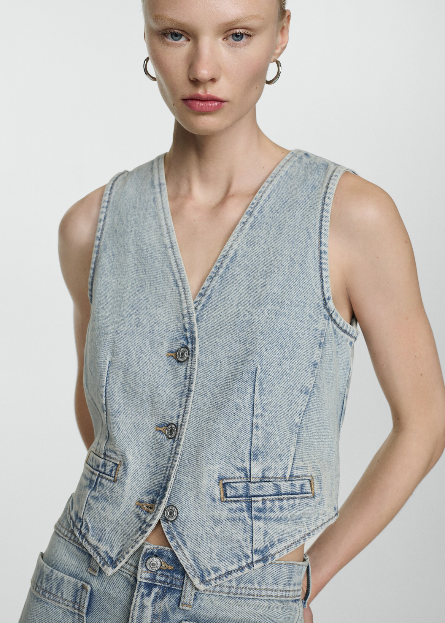 Denim gilet with seams