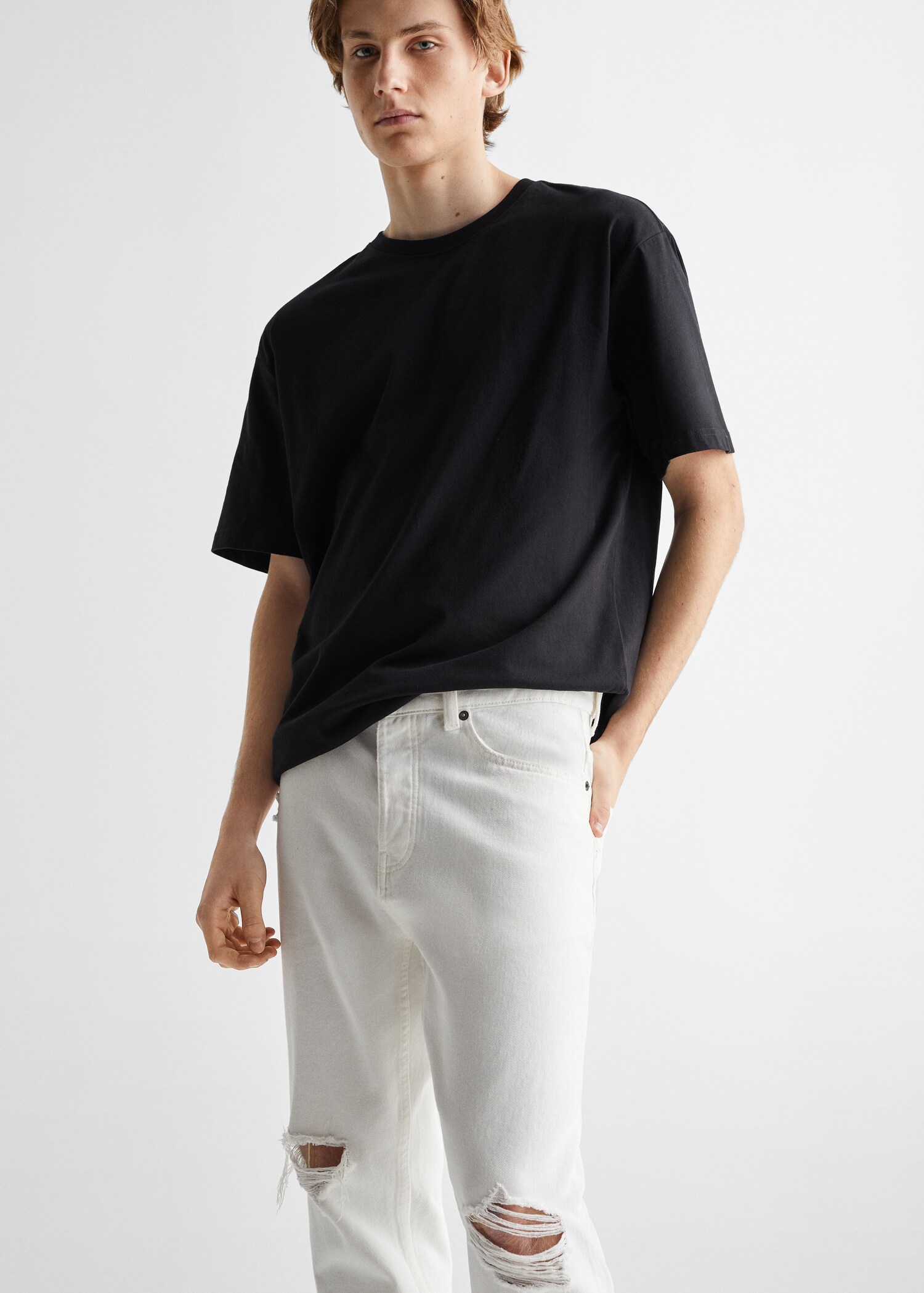 Ripped tapered-fit jeans