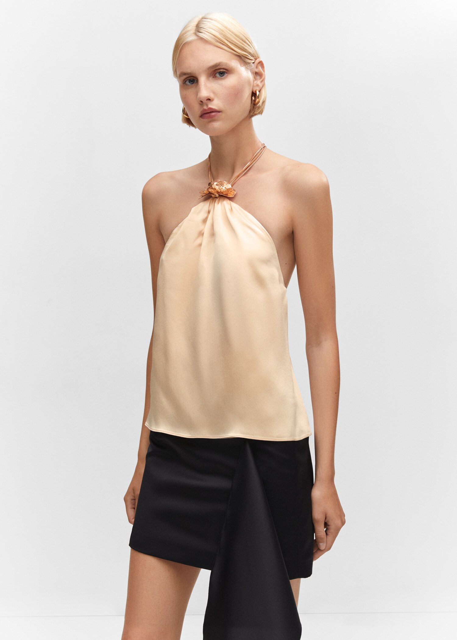 Metallic top with flower detail