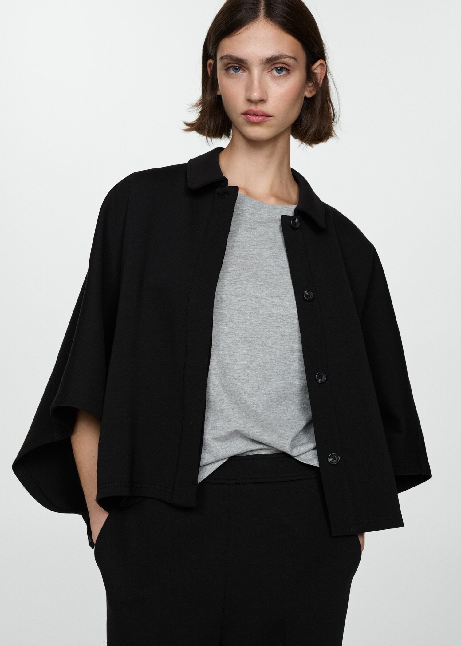 Cape jacket with buttons