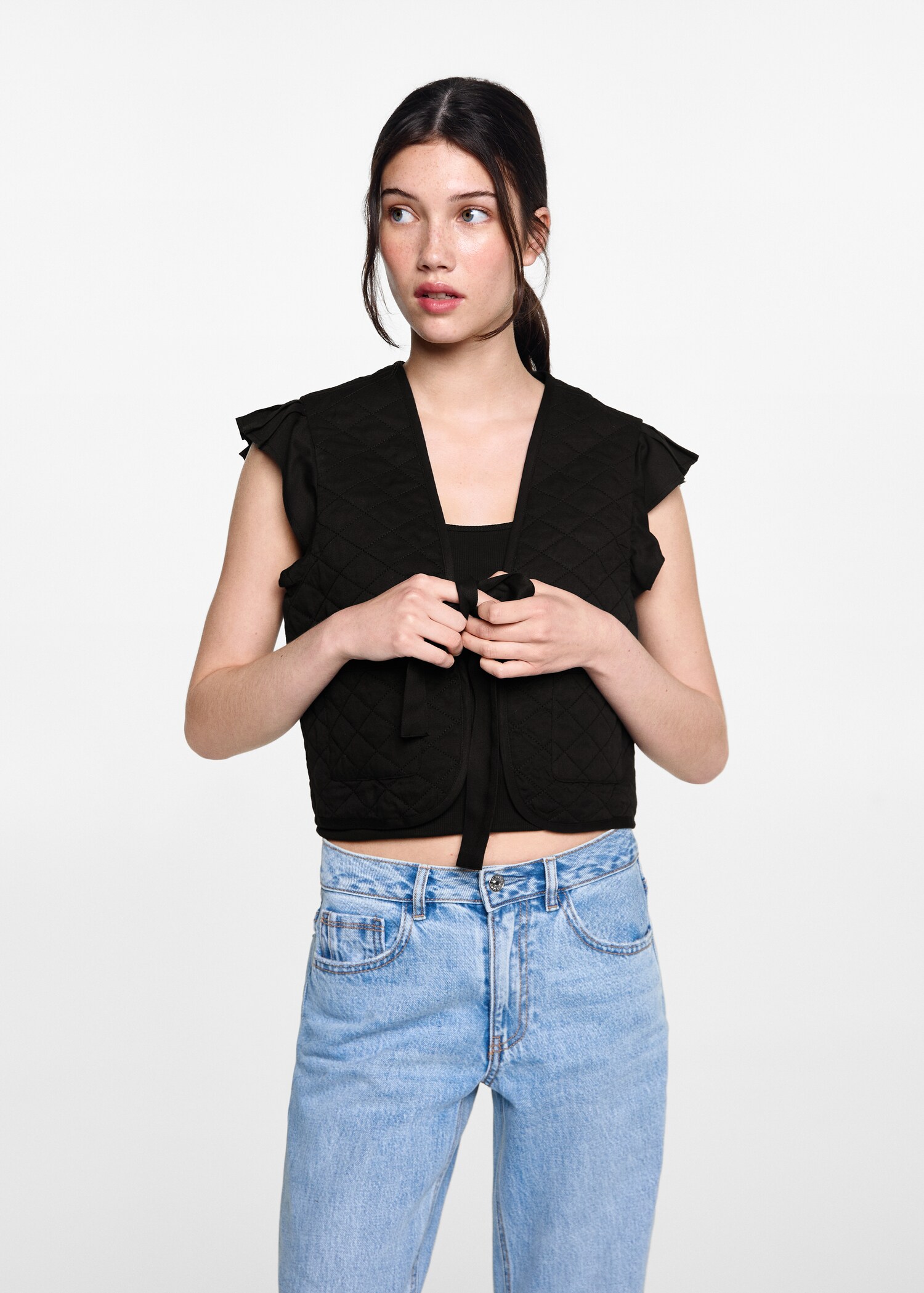 Quilted gilet with pleat