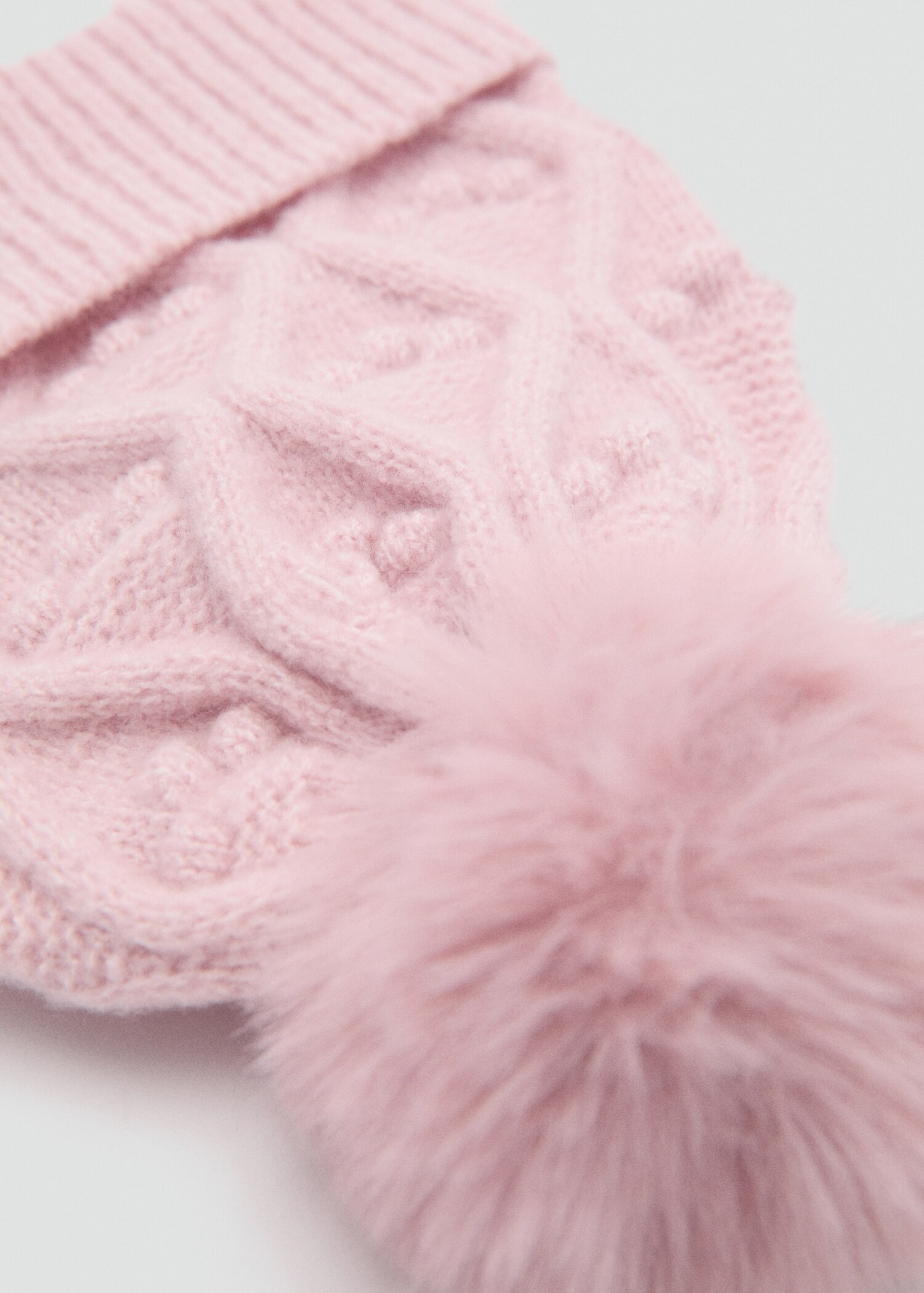 Pom pom cable-knit beanie