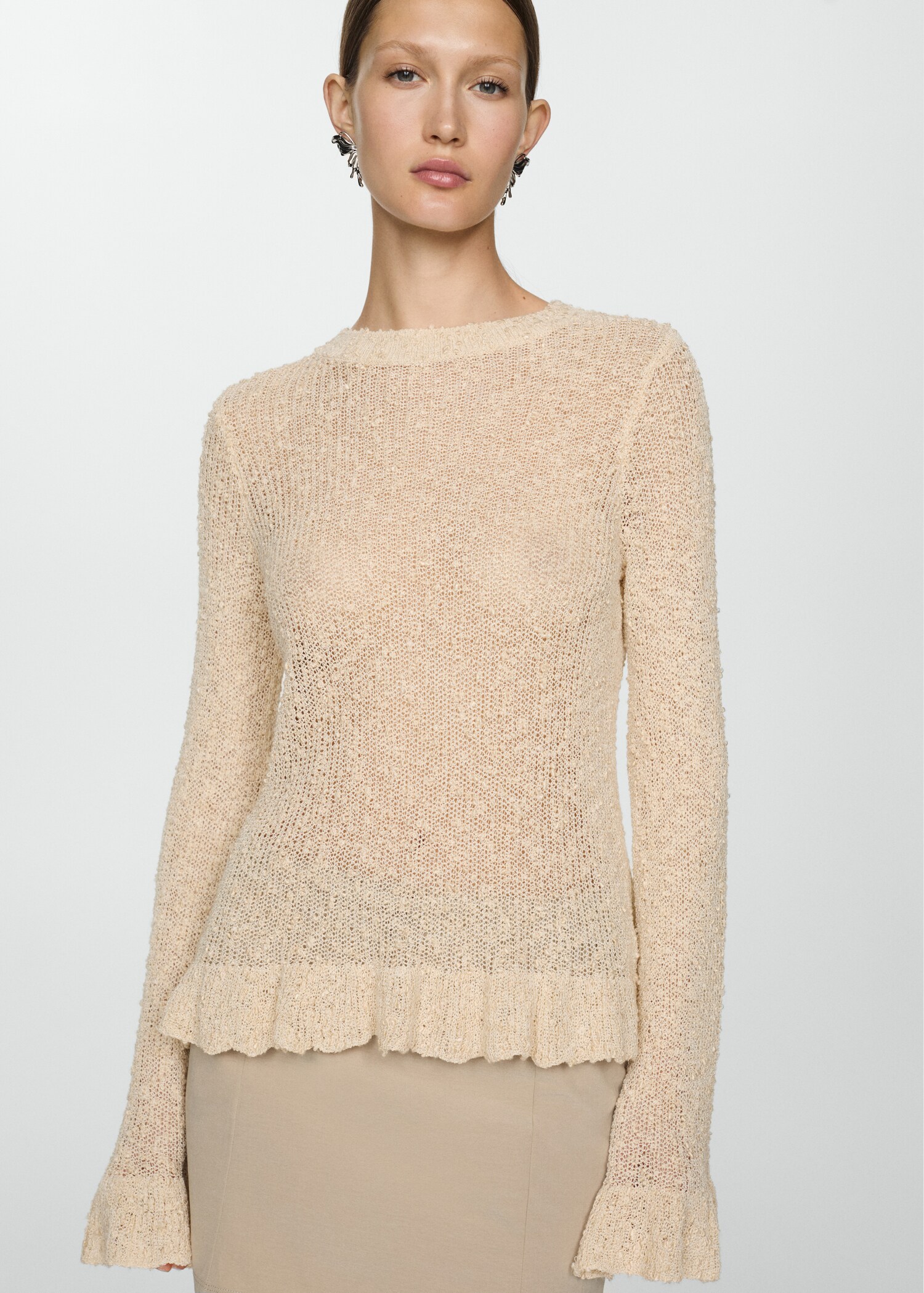 Sweater with ruffled ends