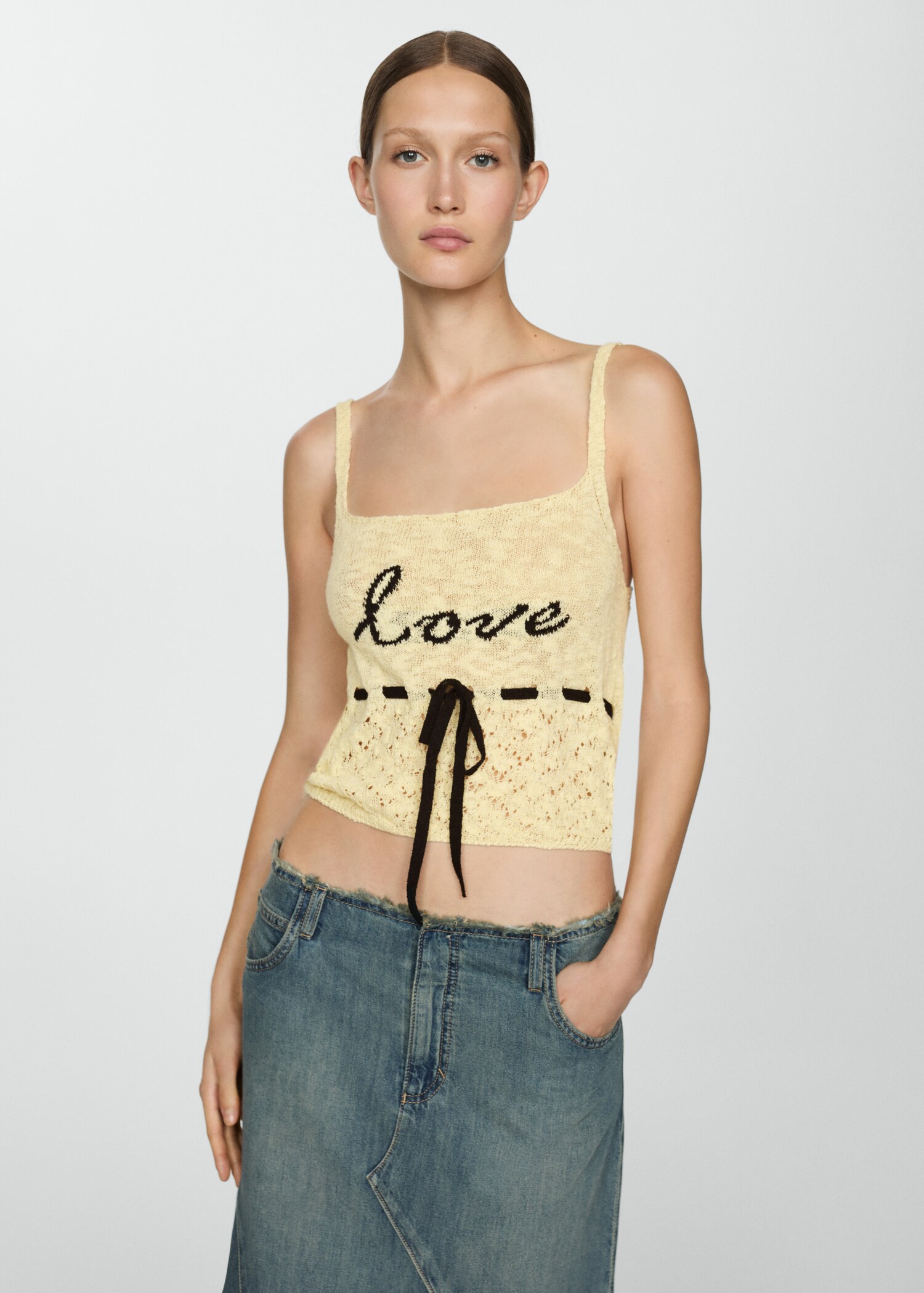 Openwork knitted top with bow